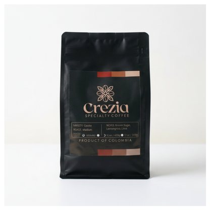 Black coffee bag with Crezia Specialty Coffee branding on a white background